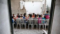 Anak-anak tampak menikmati momen ini. REUTERS/Bassam Khabieh.