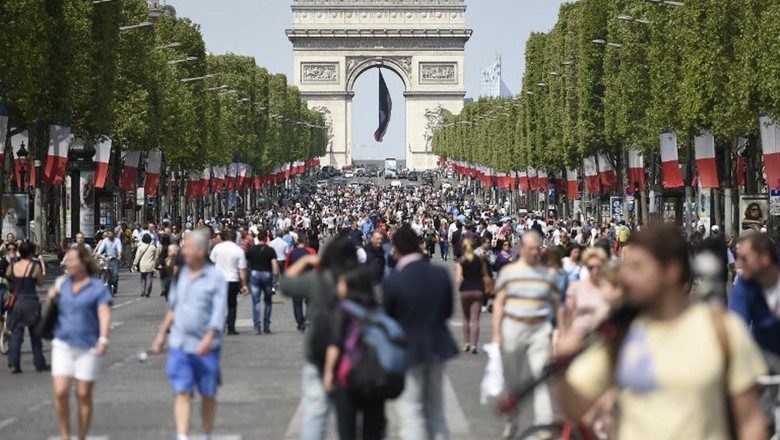 Foto: Suasana jalanan Kota Paris ketika hari bebas kendaraan (AFP) Foto: Suasana jalanan Kota Paris ketika hari bebas kendaraan (AFP)