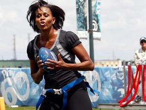 Foto: Gaya Sporty Michelle Obama yang Seksi dan Memukau