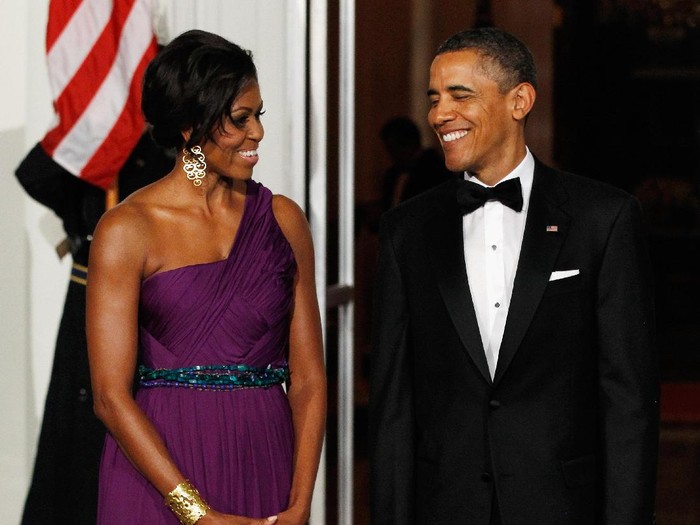 Michelle Obama WASHINGTON - JANUARY 21: President Barack Obama and first lady Michelle Obama attend the Southern Inaugural Ball on January 21, 2009 in Washington, DC. The Obamas will be attending 10 Inaugural Balls. Obama was sworn in as the 44th President of the United States, becoming the first African American to be elected President. (Photo by Brendan Hoffman/Getty Images)