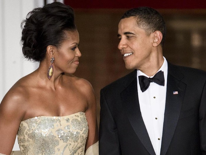 Michelle Obama WASHINGTON - JANUARY 21: President Barack Obama and first lady Michelle Obama attend the Southern Inaugural Ball on January 21, 2009 in Washington, DC. The Obamas will be attending 10 Inaugural Balls. Obama was sworn in as the 44th President of the United States, becoming the first African American to be elected President. (Photo by Brendan Hoffman/Getty Images)
