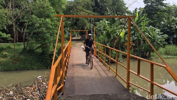 Jembatan rel lori peninggalan Belanda  disulap jadi jembatan penyeberangan