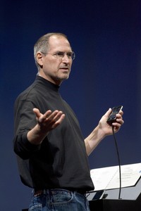 SAN FRANCISCO, CA - JANUARY 9: Apple CEO Steve Jobs gestures while delivering his keynote speech at Macworld on January 9, 2007 in San Francisco, California. During the keynote Jobs introduced the new iPhone which will combine a mobile phone, a widescreen iPod with touch controls and a internet communications device with the ability to use email, web browsing, maps and searching. The iPhone will start shipping in the US in June 2007. (Photo by David Paul Morris/Getty Images)