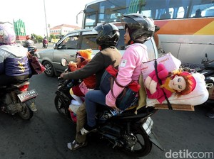 Rawan Kecelakaan dan Polusi, Hindari Mudik Bawa Anak Naik Motor