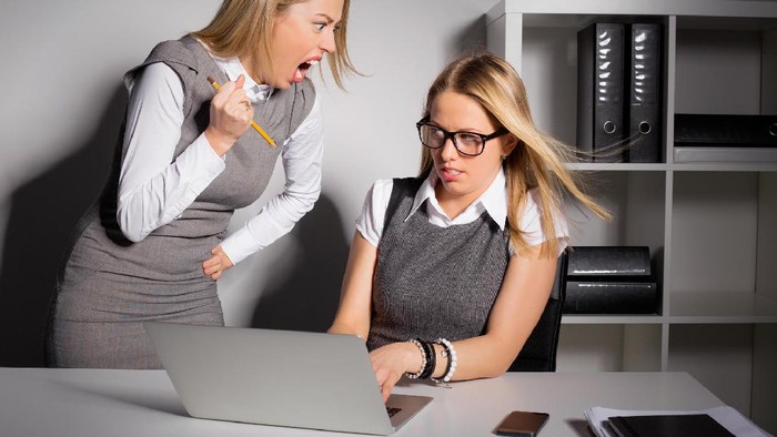 Supervisor scolding a subordinate