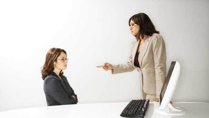 Supervisor scolding a subordinate