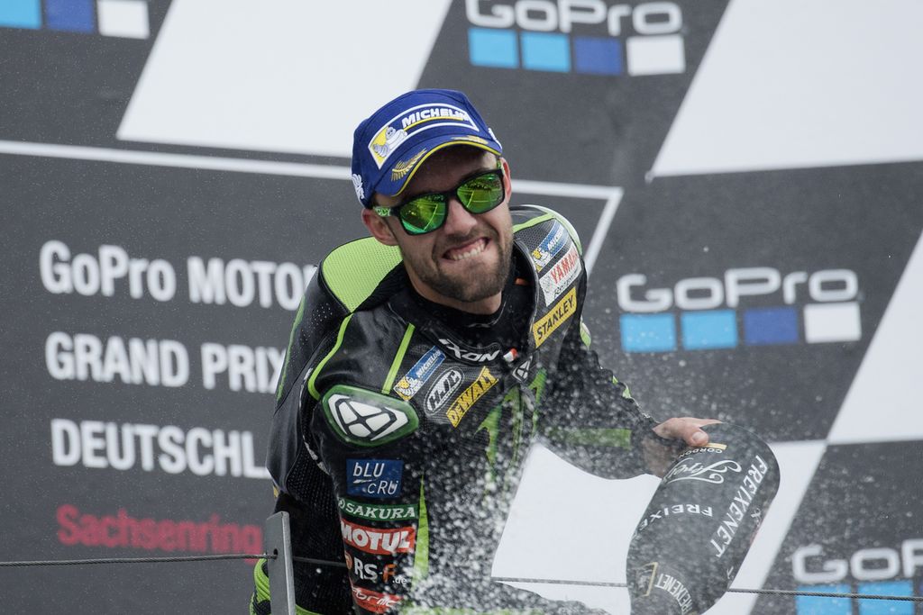 HOHENSTEIN-ERNSTTHAL, GERMANY - JULY 02:  Jonas Folger of Germany and Monster Yamaha Tech 3 celebrates the second place on the podium at the end of the MotoGP race during the MotoGp of Germany - Race at Sachsenring Circuit on July 2, 2017 in Hohenstein-Ernstthal, Germany.  (Photo by Mirco Lazzari gp/Getty Images)