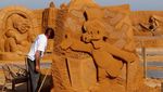 Patung Pasir Raksasa Hiasi Pesisir Pantai Belgia