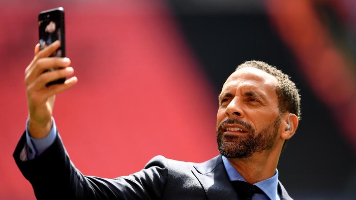 LONDON, ENGLAND - APRIL 23:  BT Sport pundit Rio Ferdinand takes a photograph prior to the Emirates FA Cup Semi-Final match between Arsenal and Manchester City at Wembley Stadium on April 23, 2017 in London, England.  (Photo by Shaun Botterill/Getty Images,)