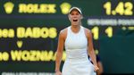 Si Cantik Wozniacki Kalahkan Babos
