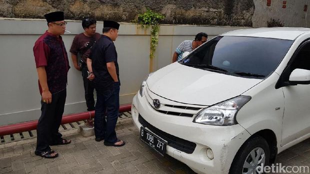 Mobil ahli IT Hermansyah yang dibacok / 
