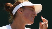 Wajah kecewa Madison Brengle. Shaun Botterill/Getty Images.