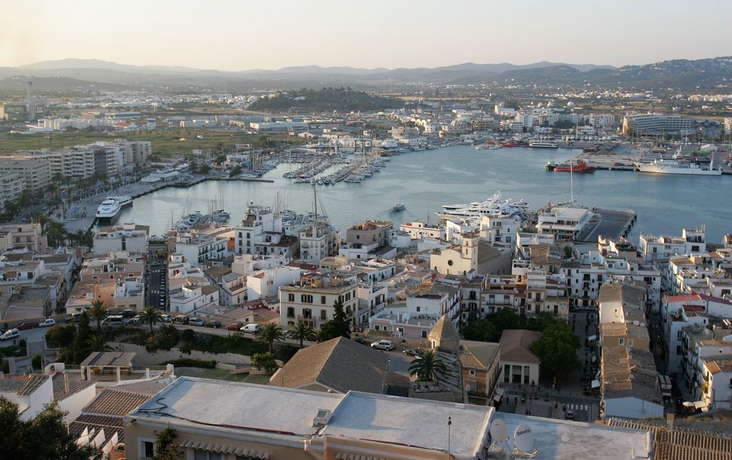IBIZA, SPAIN - JUNE 07:  A general view is seen of Eivissa Old Town marina on June 7, 2007 in Spain Ibiza. Ibiza remains one of the world's top holiday destinations for young people from around the world. For the last decade or so the island has been a mecca for clubbers with some of the bigger clubs drawing crowds of up to four thousand in peak season. The interior of the island remains a place of solitude and unspoilt natural beauty whilst coastal resorts cater for the masses of the package holiday industry.  (Photo by Chris Jackson/Getty Images)