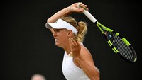 Wozniacki yang diunggulkan di tempat kelima mesti mengakui keunggulan Coco Vandeweghe 6-7 (4), 4-6. REUTERS/Tony OBrien.