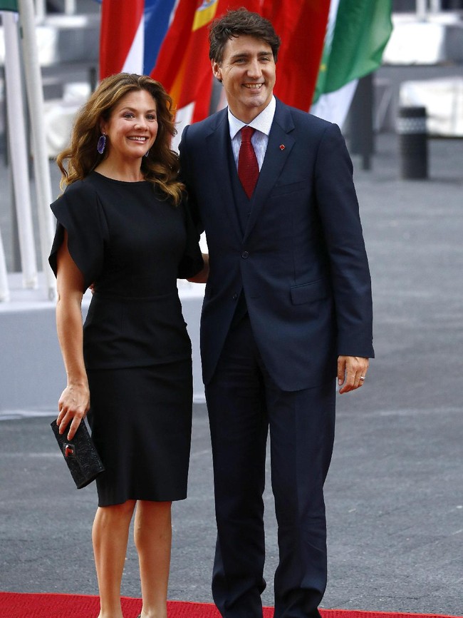 Justin Trudeau with his wife Sophie Trudeau arrive to attend a concert at the Elbphilharmonie philharmonic concert hall on the first day of the G20 economic summit on July 7, 2017 in Hamburg, Germany. The G20 group of nations are meeting July 7-8 and major topics will include climate change and migration. (Photo by Morris MacMatzen/Getty Images)