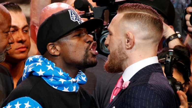 Pamer Cek 100 Juta Dolar, Mayweather Olok-olok Pendapatan McGregor Pamer Cek 100 Juta Dolar, Mayweather Olok-olok Pendapatan McGregor