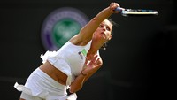 Di Wimbledon, Pliskova memang terhenti di babak kedua. Tapi hasil itu sudah cukup mengantarkan dia ke peringkat pertama dunia usai Simona Halep tumbang di perempatfinal. Foto: Julian Finney/Getty Images