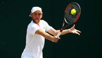 Dudi Sela mundur di babak ketiga saat menghadapi Grigor Dimitrov karena cedera pada kunci paha. Foto: Michael Steele/Getty Images