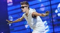 Justin Bieber seperti tidak pernah bisa menahan emosinya yang meluap-luap. Foto: Getty Images