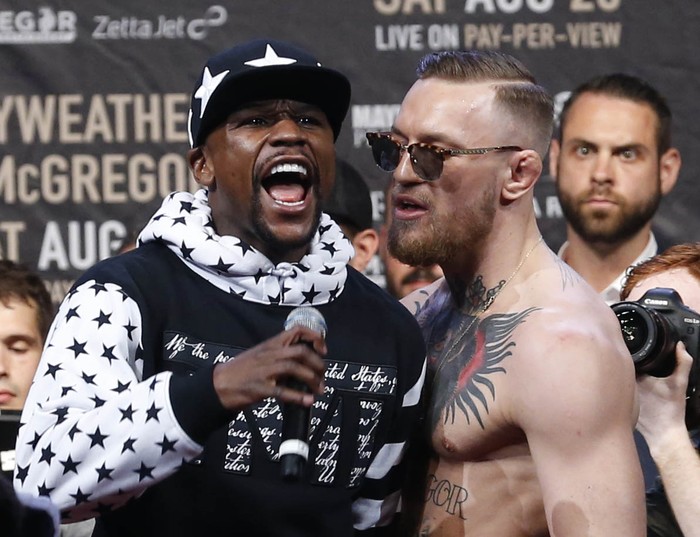 Jul 13, 2017; Brooklyn, NY, USA; Floyd Mayweather and Conor McGregor during a world tour press conference to promote the upcoming Mayweather vs McGregor boxing fight at Barclays Center. Mandatory Credit: Noah K. Murray-USA TODAY Sports