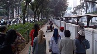 Jalan kaki merupakan olahraga kategori ringan yang memiliki banyak manfaat untuk kesehatan jantung dan pembuluh darah serta mencegah kegemukan dan penyakit tidak menular lainnya. (Foto: Koalisi Pejalan Kaki)