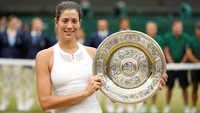 Petenis Spanyol, Garbine Muguruza, menyabet dua gelar juara grand slam sepanjang kariernya, Prancis Terbuka 2016 dan Wimbledon 2017. (REUTERS/Matthew Childs)