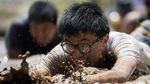 Foto: Serunya Lomba Lari Lumpur di Shanghai, China