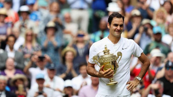Roger Federer menjuarai Wimbledon untuk kedelapan kalinya (Foto: Daniel Leal-Olivas - Pool/Getty Images) Roger Federer menjuarai Wimbledon untuk kedelapan kalinya (Foto: Daniel Leal-Olivas - Pool/Getty Images)