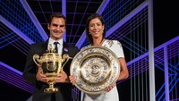 Tahun ini saat berusia 35 tahun, Roger Federer kembali menjadi juara dan mengukir sejumlah rekor baru. Di bagian putri Garbine Muguruza, 23 tahun, yang jadi jawaranya. (AELTC-Pool/Getty Images)