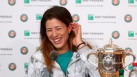 Garbine Muguruza merupakan pemain blasteran dengan ayahnya, Jose Antonio Muguruza, orang Bosque, Spanyol, sedangkan ibundanya, Scarlet Blanco, dari Venezuela. (Julian Finney/Getty Images)