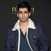 Zayn Malik memiliki karismanya sendiri. Ditambah dengan brewoknya, Zayn Malik makin terlihat tampan dan maskulin. Foto: Getty Images