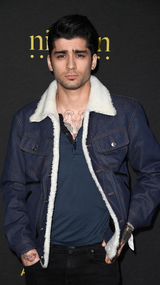 Zayn Malik memiliki karismanya sendiri. Ditambah dengan brewoknya, Zayn Malik makin terlihat tampan dan maskulin. Foto: Getty Images