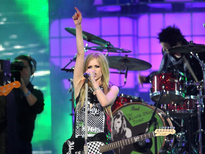 TORONTO, ON - JUNE 19:  Avril Lavigne performs on stage at the 2011 MuchMusic Video Awards on June 19, 2011 in Toronto, Canada.  (Photo by Jag Gundu/Getty Images)