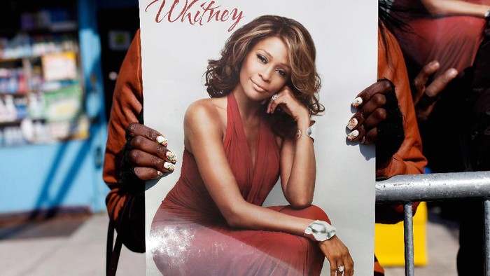 NEWARK, NJ - FEBRUARY 18:  Fans mourn at the funeral service for Whitney Houston on February 18, 2012 in Newark, New Jersey. Whitney Houston was found dead in her hotel room at The Beverly Hilton hotel on February 11, 2012.  (Photo by Allison Joyce/Getty Images)