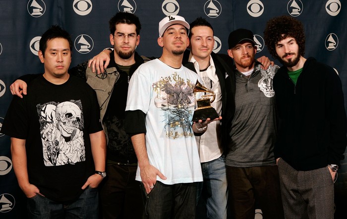 LOS ANGELES, CA - FEBRUARY 08:  The group Linkin Park poses with their award in the press room at the 48th Annual Grammy Awards at the Staples Center on February 8, 2006 in Los Angeles, California.  (Photo by Kevin Winter/Getty Images)