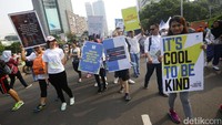 Aksi berlangsung di tengah-tengah warga yang menikmati car free day di kawasan Sudirman-Thamrin.