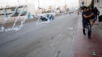 Bentrokan ini terjadi di depan pos pemeriksaan Qalandiya. MInggu (23/7) waktu setempat. REUTERS/Mohamad Torokman.
