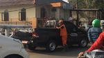 Foto: Melihat Kerja Pasukan Oranye dkk yang Disebut Malas-malasan