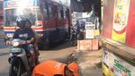 Foto: Melihat Kerja Pasukan Oranye dkk yang Disebut Malas-malasan