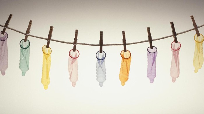 Kondom Condom and packages. Vector flat illustration isolated on white background.
