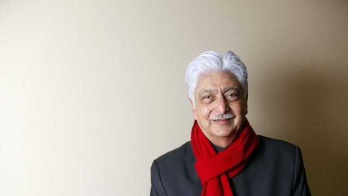 Azim Premji, chairman of Wipro Ltd., poses for a photograph following a television interview in Davos, Switzerland, on Wednesday, Jan. 25, 2012. The 42nd annual meeting of the World Economic Forum will be attended by about 2,600 political, business and financial leaders at the five-day conference. Photographer: Simon Dawson/Bloomberg via Getty Images