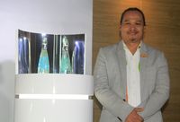 Goresan Biru Hijau Eko Nugroho Percantik Botol Air Mineral Premium Ini