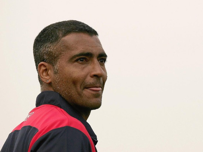 GOSFORD, AUSTRALIA - NOVEMBER 25:  Romario of Adelaide United looks at the field before the start of play in the round fourteen Hyundai A-League match between the Central Coast Mariners and Adelaide United at Bluetongue Central Coast Stadium November 25, 2006 in Gosford, Australia.      (Photo by Mark Kolbe/Getty Images)