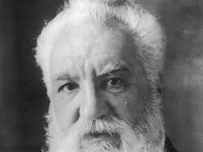 circa 1910:  Alexander Graham Bell (1847 - 1922) a Scots-born American inventor who established  the Bell Telephone Company. Bell, born in Edinburgh, worked with his father, Scottish educator Alexander Melville Bell, before emigrating to North America in 1871. In 1873 he became Professor of Vocal Phisiology at Boston University. He experimented with various devices for transmitting sound until he sent the first acoustic message to his assistant in 1875. Bell patented the telephone the next year and went on to invent the photophone and gramophone. He also founded the journal  'Science' and invented the tetrahedral kite.  (Photo by Topical Press Agency/Getty Images)