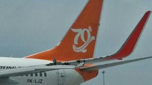 Foto: Pesawat Lion Air-Wings Air Senggolan di Bandara Kualanamu