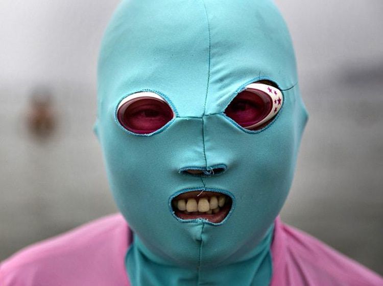 Potret Warga China Pakai Facekini Imbas Suhu Panas Ugal-ugalan