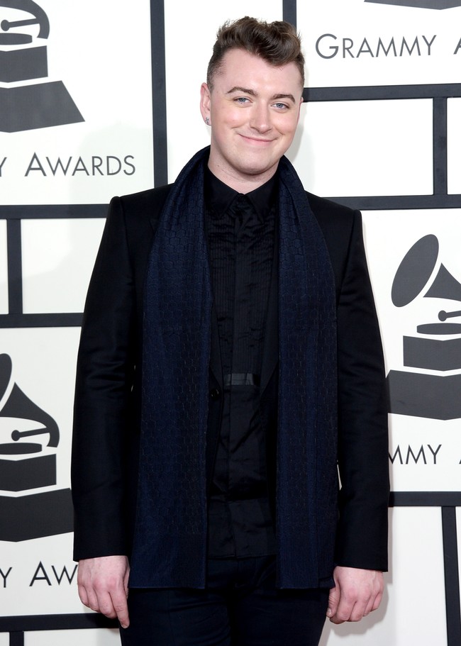 Kendati bertubuh gemuk, Sam terlihat nyaman dan percaya diri. Di foto ini, Sam melemparkan senyum di karpet merah Grammy Awards Februari 2014 silam. Foto: Getty Images
