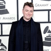 Kendati bertubuh gemuk, Sam terlihat nyaman dan percaya diri. Di foto ini, Sam melemparkan senyum di karpet merah Grammy Awards Februari 2014 silam. Foto: Getty Images