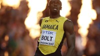Usain Bolt cuma finis posisi ketiga dan berhak mendapat medali perunggu dengan waktu 9,95 detik. Bolt seakan tak percaya dia gagal menang (Foto: REUTERS/Phil Noble)