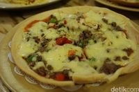 Pizza Il Migliore yang jadi menu andalan Noi Pizza.